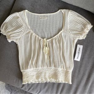Urban Outfitters white/cream bouncy sheer top size S